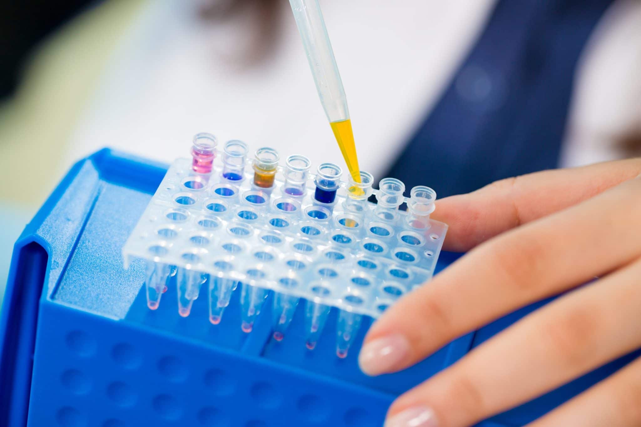 Young female technician in genetic laboratory with PCR | Other Services