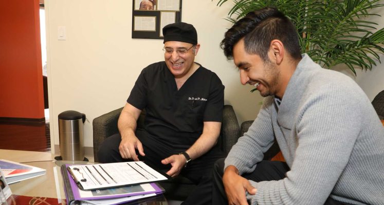 Dr. Melamed discussing Hair Restoration Options with a patient in Los Angeles, California